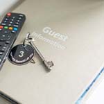 gues book with number 3 keyring 